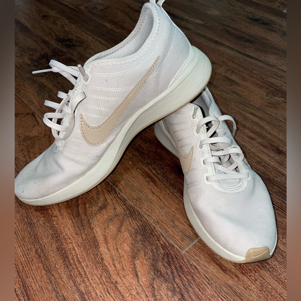 Tan women’s Nike shoes